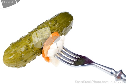 Image of  Pickled cucumber on a fork