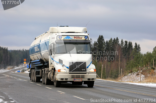 Image of Conventional Volvo NH12 Semi Tanker on the Road