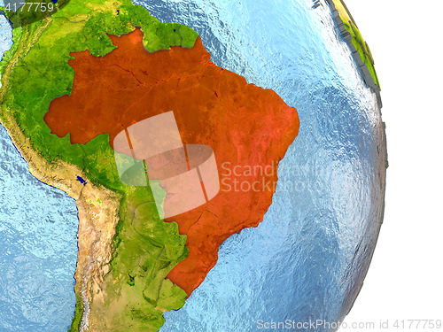 Image of Brazil in red on Earth