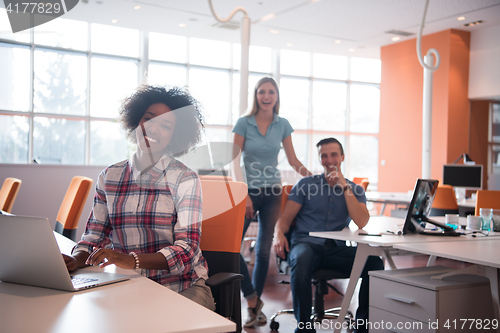 Image of African American informal business woman working in the office