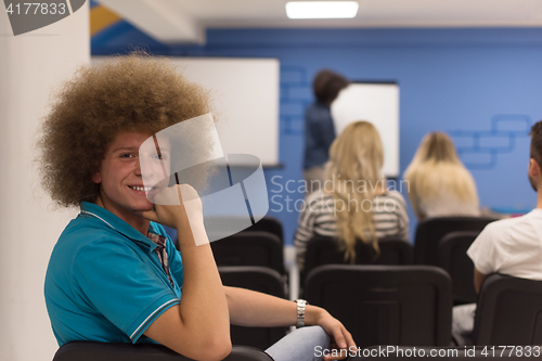 Image of Portrait of young informal businessman