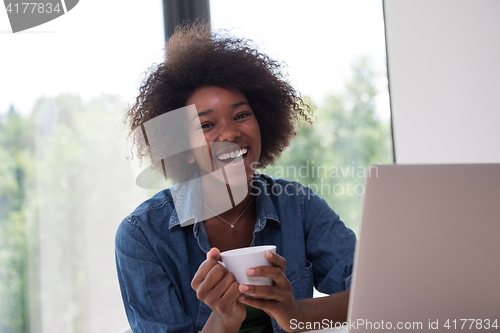 Image of African American woman in the living room