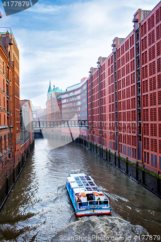 Image of Hamburg city canal and brick buildings