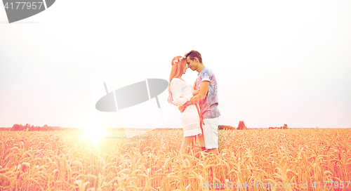 Image of happy smiling young hippie couple outdoors