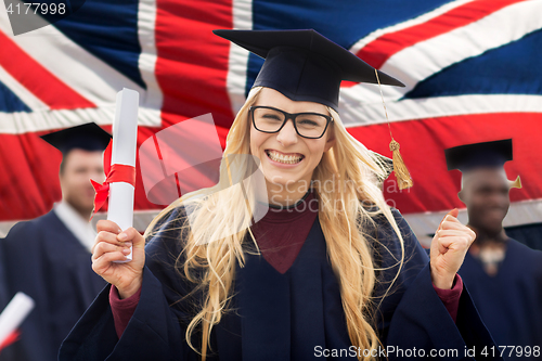 Image of happy student with diploma celebrating graduation