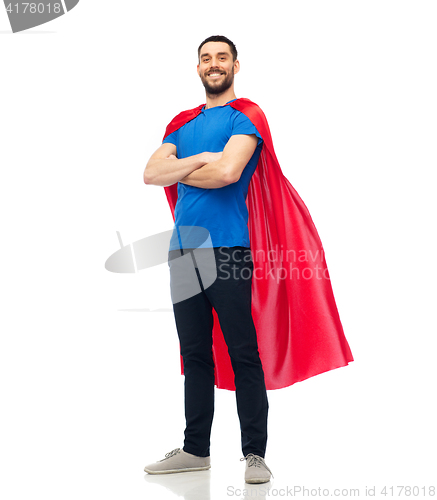 Image of happy man in red superhero cape