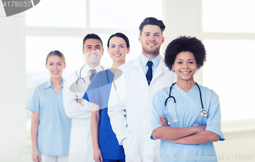 Image of group of happy doctors at hospital