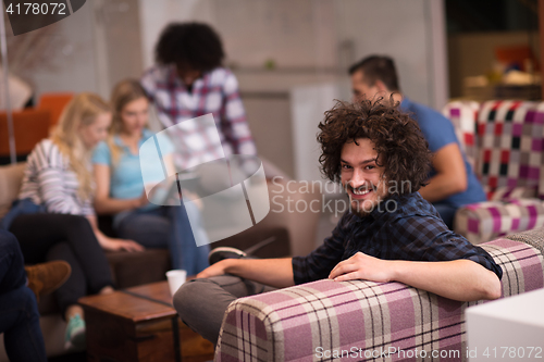 Image of Portrait of young informal businessman