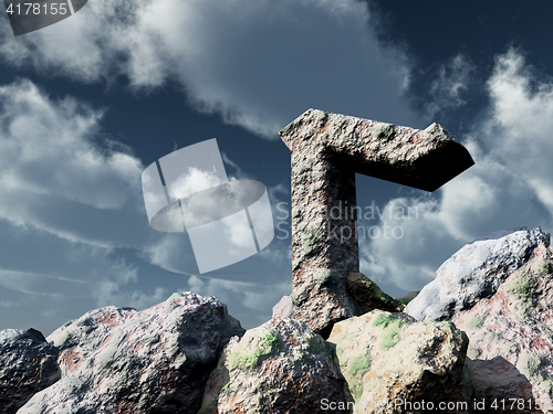 Image of rune rock under cloudy blue sky - 3d illustration