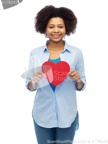 Image of happy african american woman with red heart shape