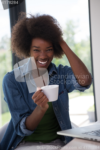 Image of African American woman in the living room