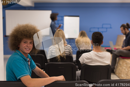Image of Portrait of young informal businessman