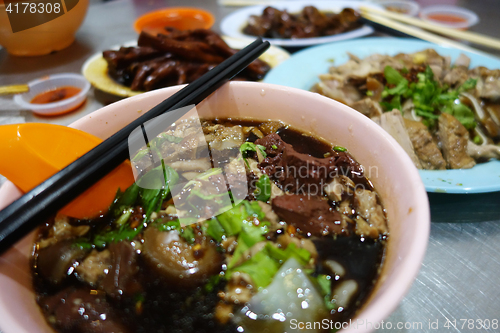 Image of Penang duck kway chap, noodle rolls in soup