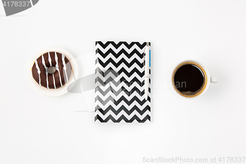 Image of Top view of white office female workspace with notebook