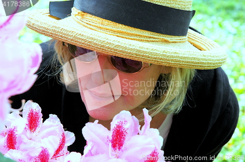 Image of Mature female blond beauty.