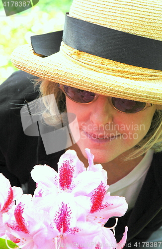 Image of Mature female blond beauty.