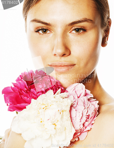 Image of young beauty woman with flower peony pink closeup makeup soft te