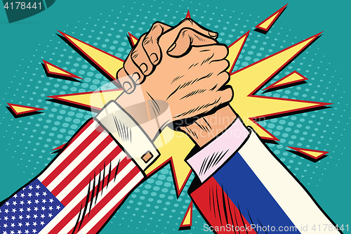 Image of USA vs Russia Arm wrestling fight confrontation