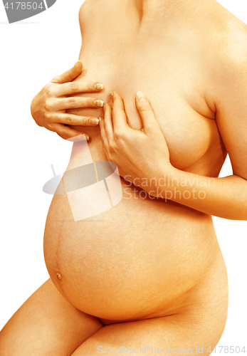 Image of pregnant woman that covers her breast