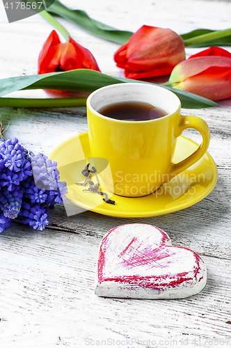 Image of tea and bunch of tulips