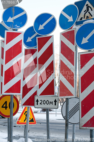 Image of mess of traffic signs