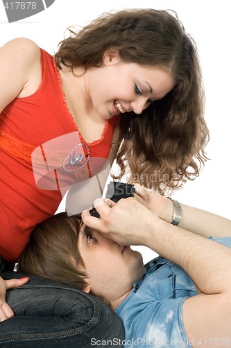 Image of Photographer taking pictures of the young woman. isolated 2