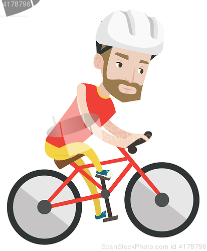 Image of Young man on bicycle traveling in the mountains.