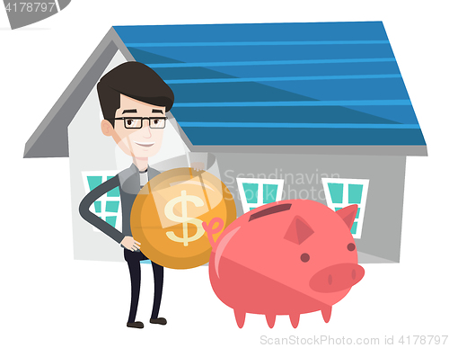 Image of Man puts money into piggy bank for buying house.