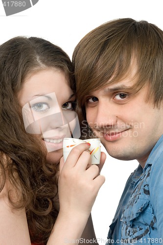 Image of Portrait of young couple with glasses in hands. Isolated