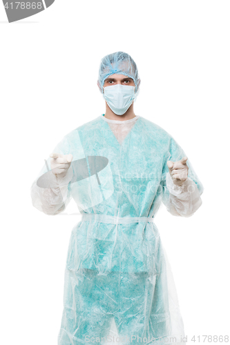 Image of Surgeon portrait. points finger. isolated on white background