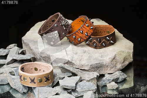 Image of bracelets with spikes and skulls