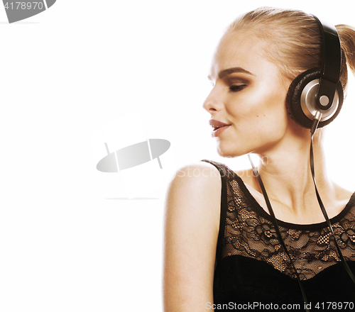 Image of young sweet talented teenage girl in headphones singing isolated