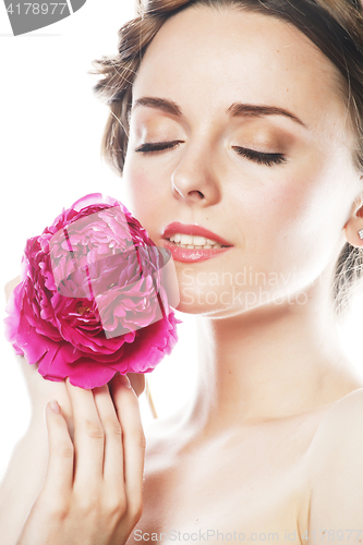 Image of young beauty woman with flower peony pink closeup makeup soft te