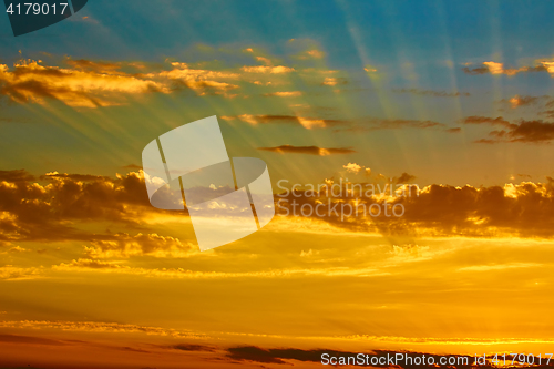 Image of good red sunset over darken sea