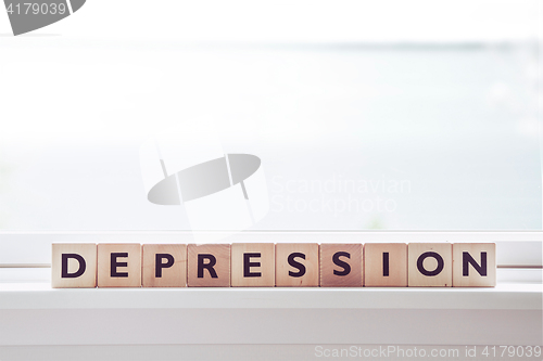 Image of Depression word made om wooden cubes