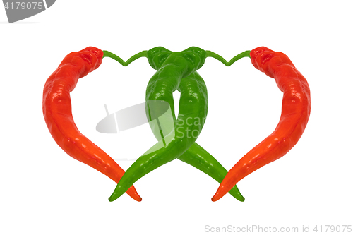 Image of Red and green chili peppers in love. Hearts composed of peppers.