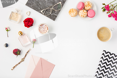 Image of Top view of white office female workspace with notebook