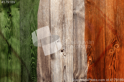 Image of National flag of Ireland, wooden background