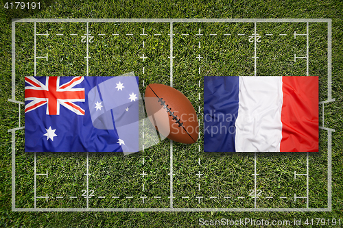 Image of Australia vs. France\r flags on rugby field