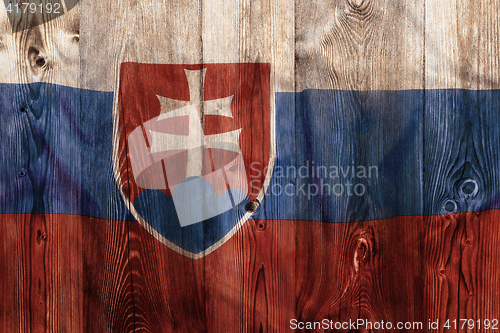 Image of National flag of Slovakia, wooden background