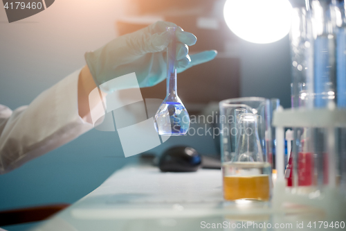 Image of Lab assistant in white coat