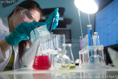 Image of Young girl carries chemical reactions