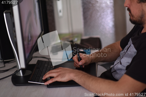 Image of graphic designer at work