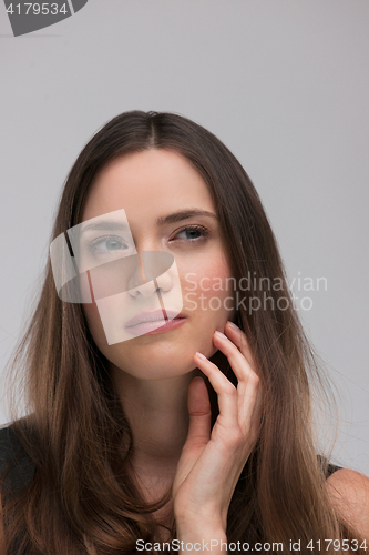 Image of portrait  of beautiful young brunette woman