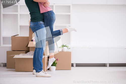 Image of happy Young couple moving in new house