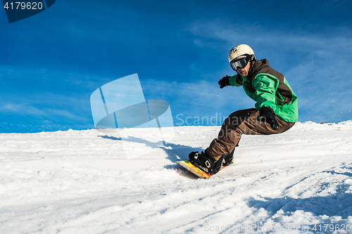 Image of Snowboard freerider in the mountains