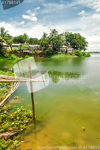 Image of Houses by river