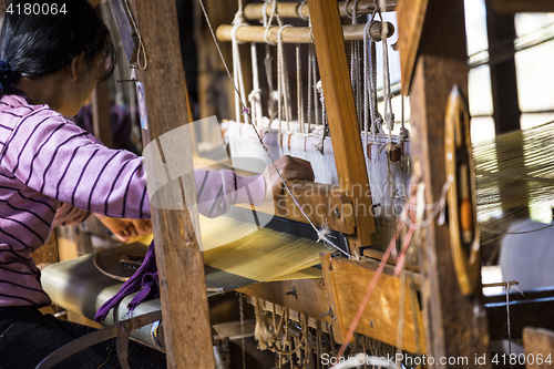 Image of woman Weaving