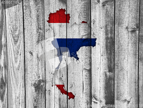 Image of Map and flag of Thailand on weathered wood