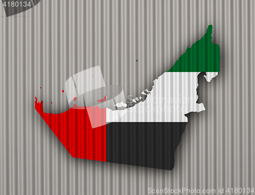 Image of Map and flag of United Arab Emirates on corrugated iron